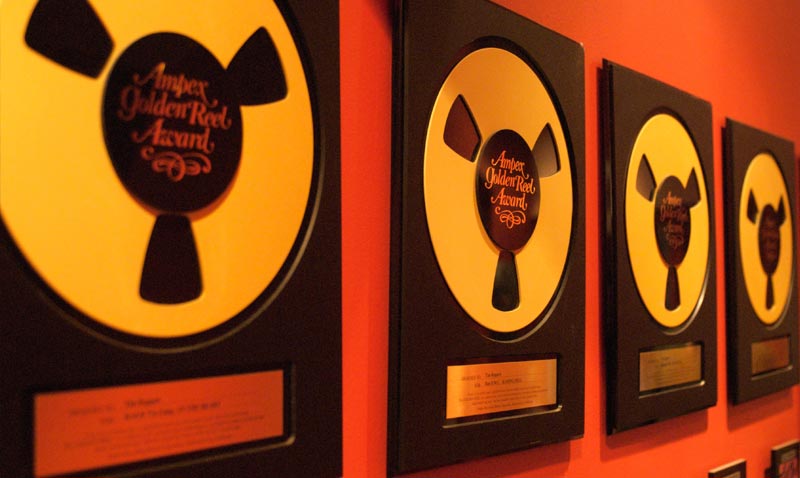 Portfolio Image: Photo of Awards on wall at REP Studio.
