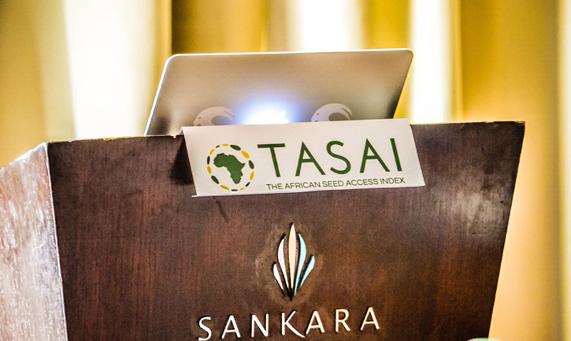 Portfolio Image: TASAI logo on plaque on speaker podium.