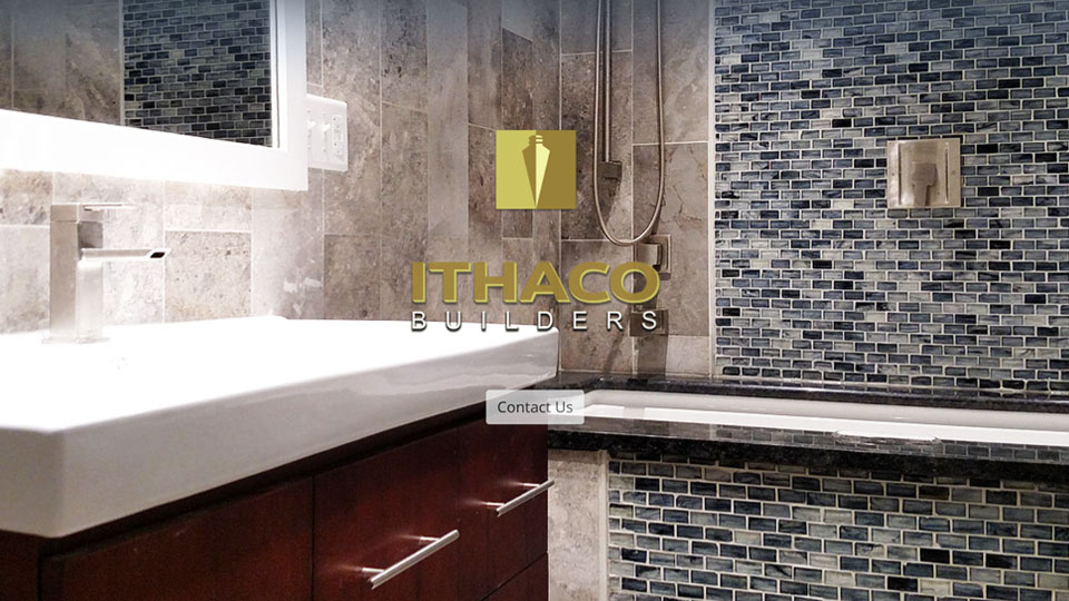 Image of custom bathroom renovation with ITHACO Builders logo overlaid on top, centered.